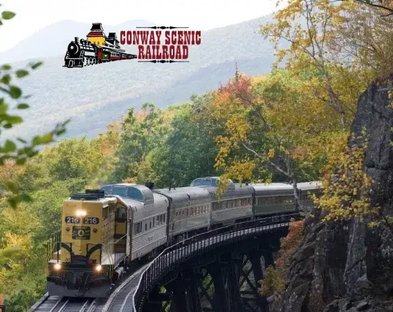 Conway Scenic Railroad locomotive and passenger cars in fall foliage