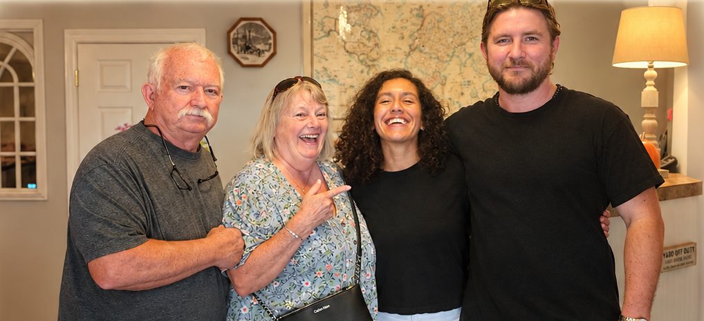 The Petersons with Shea and his fiancée at the Scenic Inn front desk.